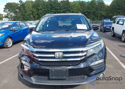 2017 Honda Pilot Touring z USA, uszkodzony, nr VIN 5FNYF5H91HB005559